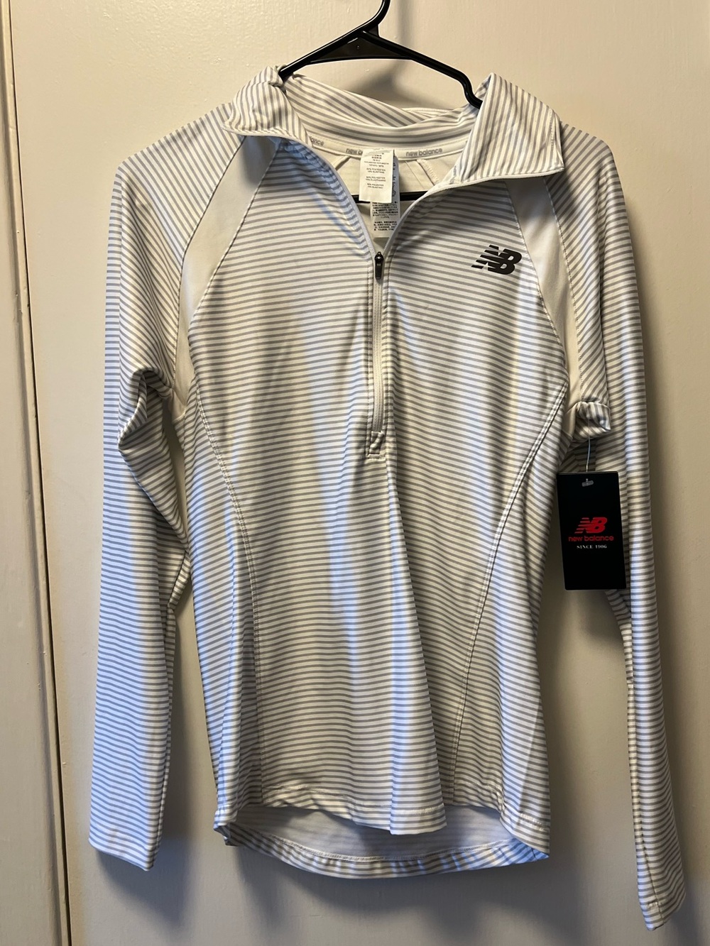 New Balance Woman’s White and Gray Striped Long-Sleeve Half-Zip Shirt